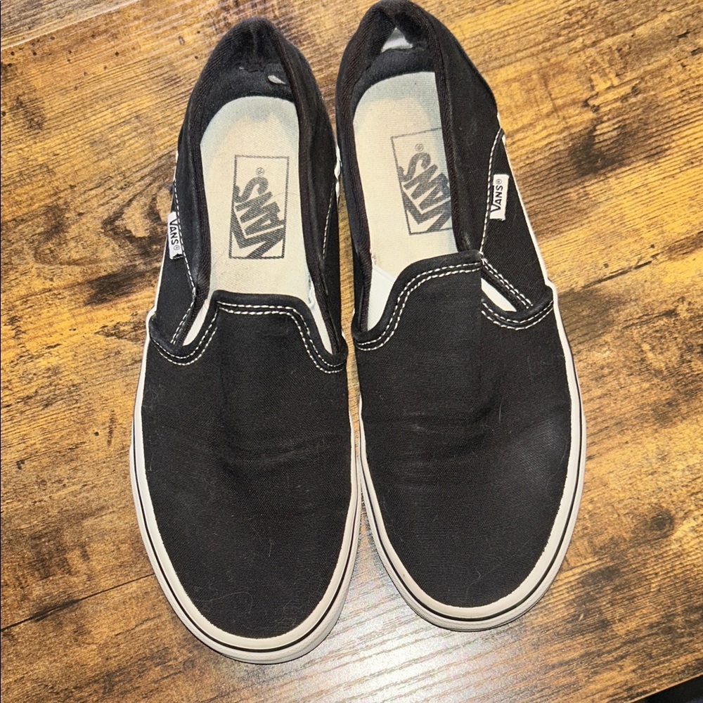 Vans Black and White Slip-On Sneakers